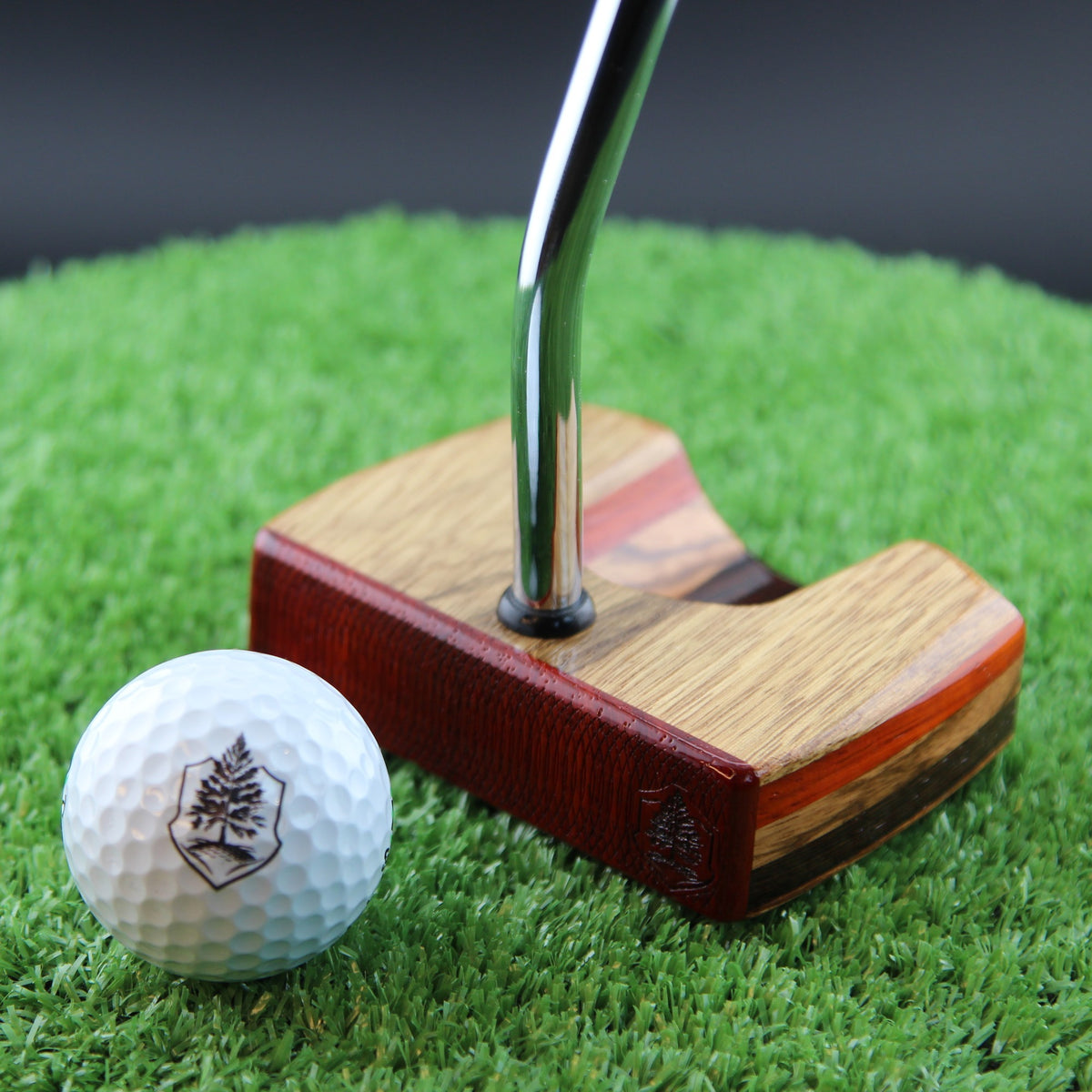 TimberTouch Korina Putter Woodrich Regal wood putter, White Limba and Padauk, zero torque center shaft – face view with golf ball