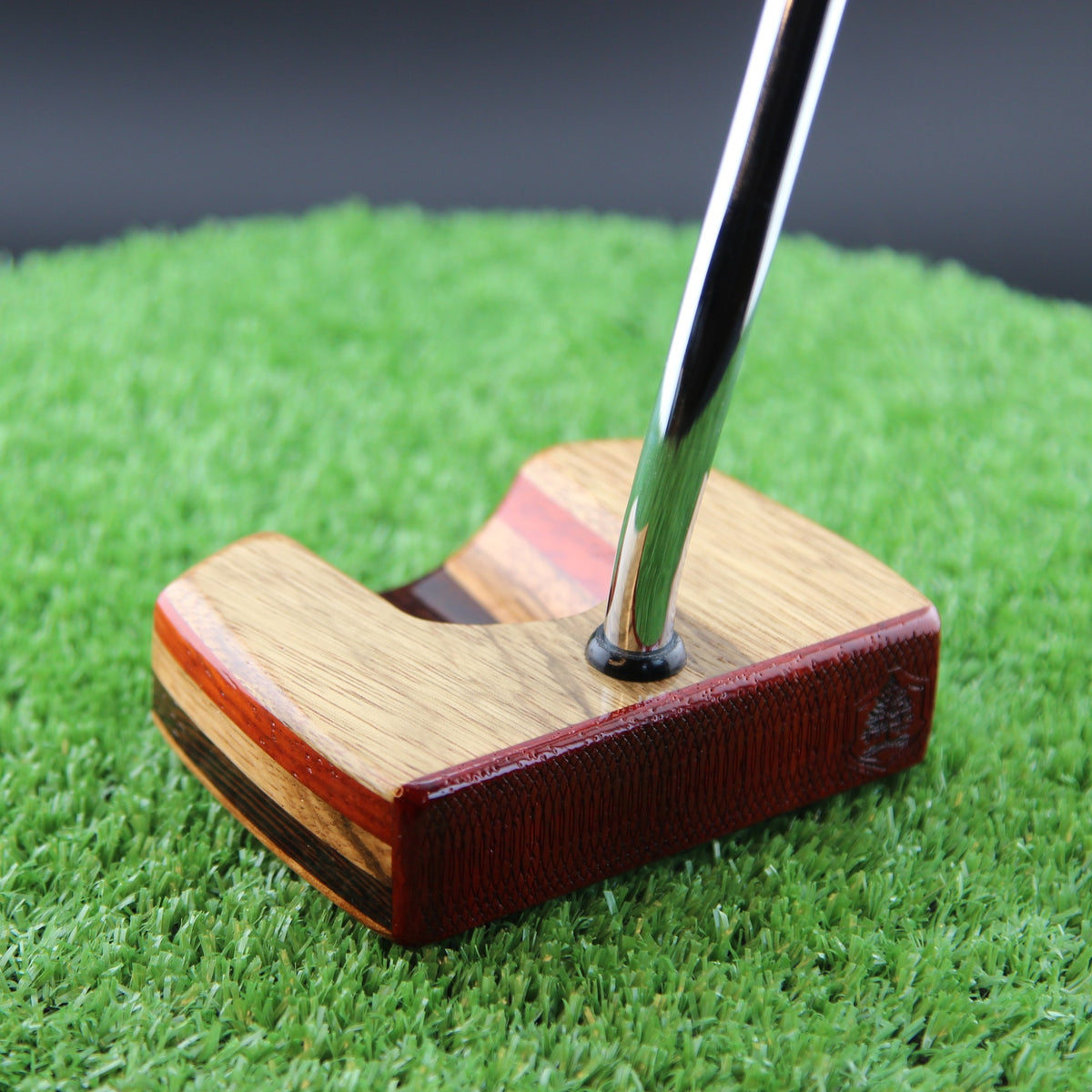 TimberTouch Korina Putter Woodrich Regal wood putter, White Limba and Padauk, zero torque center shaft – heel view