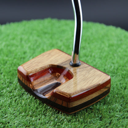 TimberTouch Korina Putter Woodrich Regal wood putter, White Limba and Padauk, zero torque center shaft – toe and heel angle view