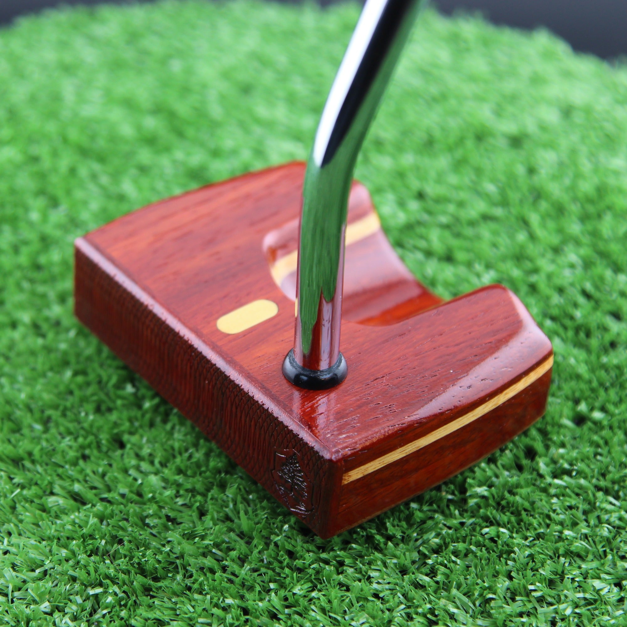 TimberTouch Woodrich putter in Padauk, Walnut and Canarywood - face and heel angle view
