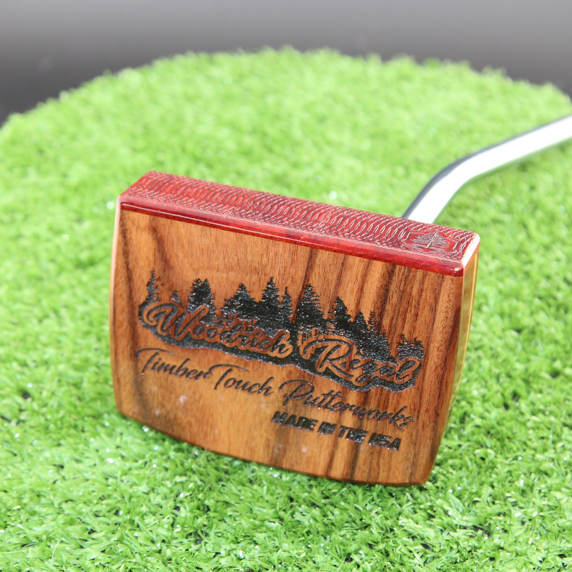 TimberTouch Woodrich putter in Padauk, Walnut and Canarywood - sole with brand engraving