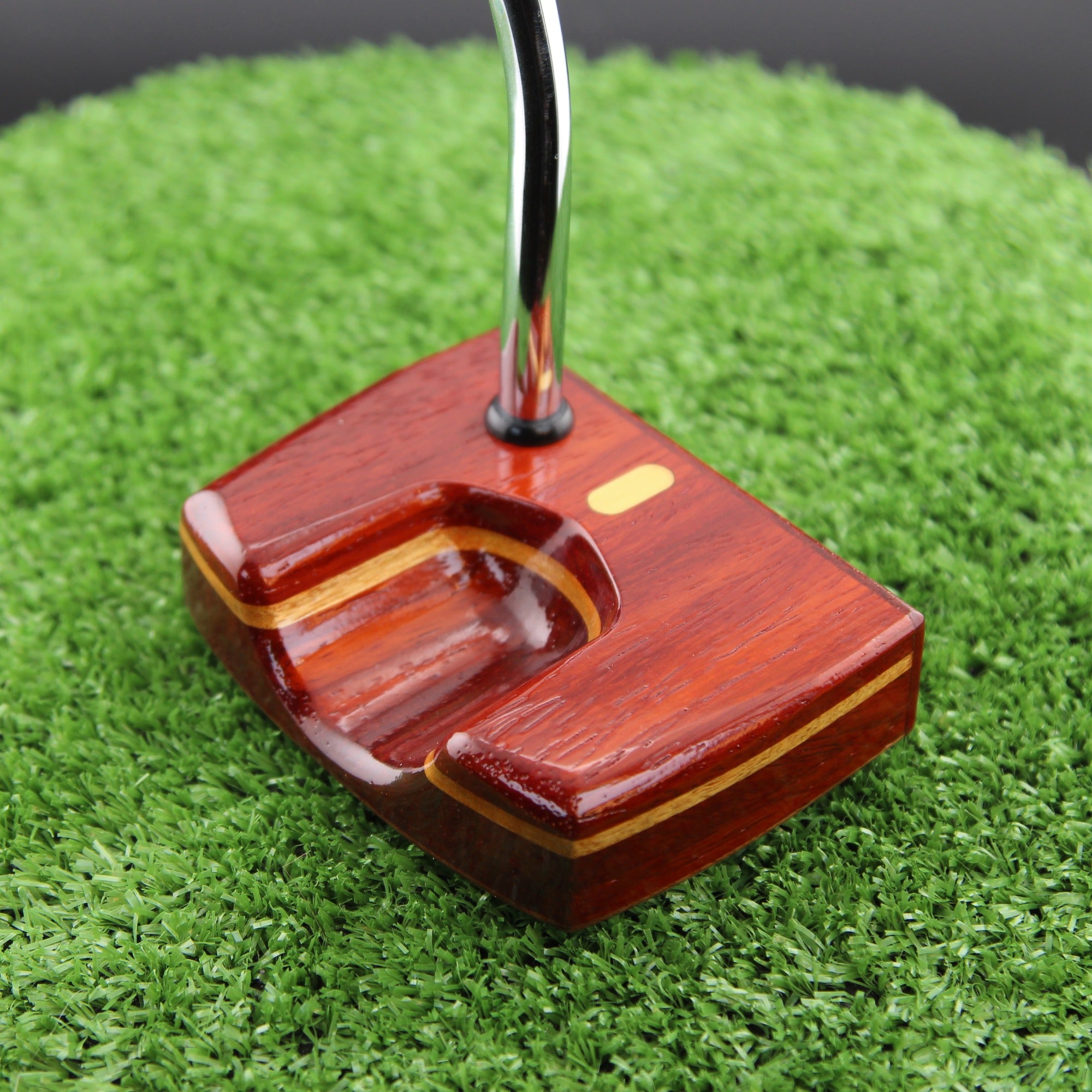 TimberTouch Woodrich putter in Padauk, Walnut and Canarywood - toe and heel angle view