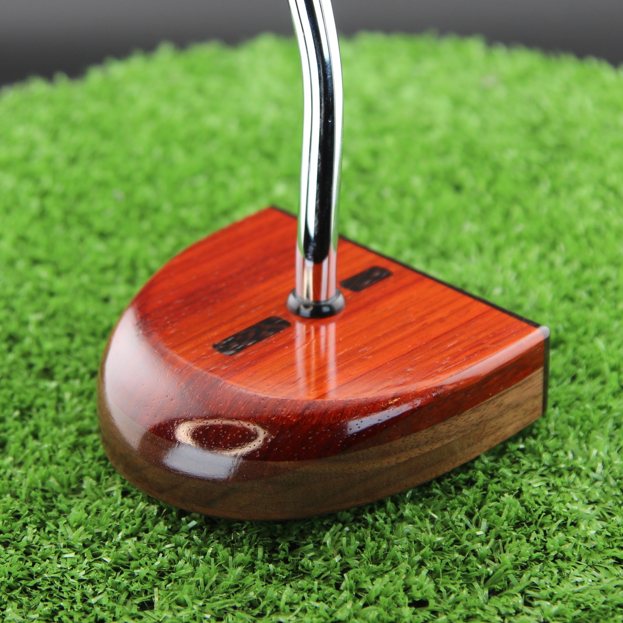 TimberTouch RedHat mallet wood putter with Purpleheart and Padauk center shaft zero torque – toe and heel angle view